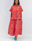 Model wearing red cat print shirt and culotte.