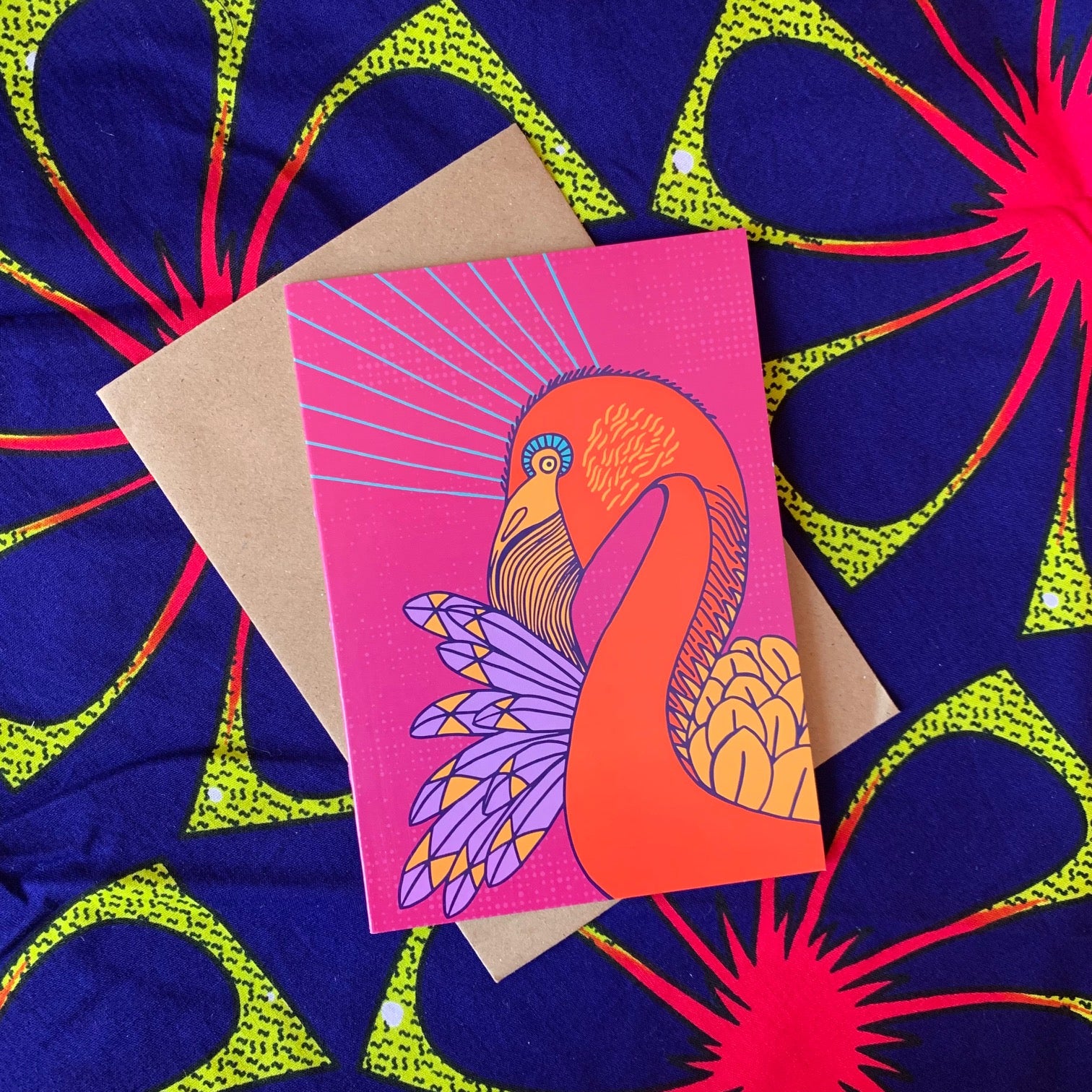 Hot pink greeting card with Red, purple orange flamingo