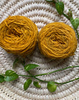 Display of turmeric colored yarn