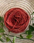 display of clay colored yarn