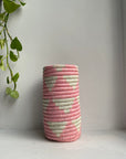 Display of bubble gum pink and white colored vase