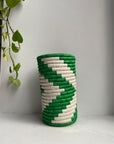 Display of white and green chevron vase