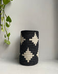 Display of white and black vase