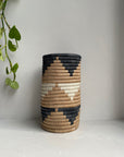 Display of black and white triangle vase