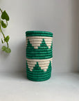Display of green and white triangle vase