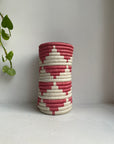 Display of rose pink and white triangle vase