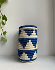 Display of blue and white triangle vase