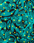 Close up display of teal, black and yellow floral print sleeveless shirt, fabric.