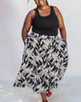 Model wearing black and white abstract culotte.