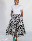 Model wearing black and white abstract culotte.