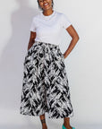 Model wearing black and white abstract culotte.