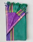 teal-green, purple kikoi towel