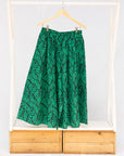 Display of green and black culotte.