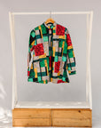 Display of mutlicolor abstract print shirt.