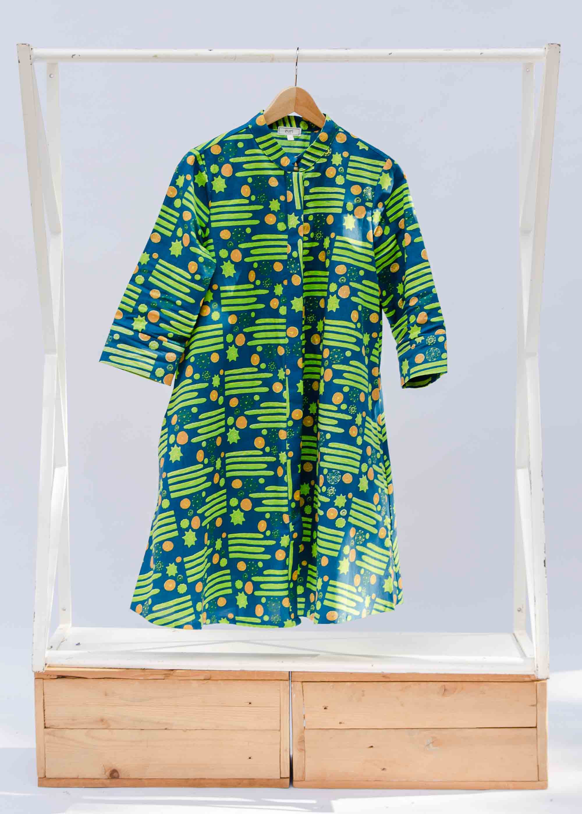 display of a blue and green cactus design dress