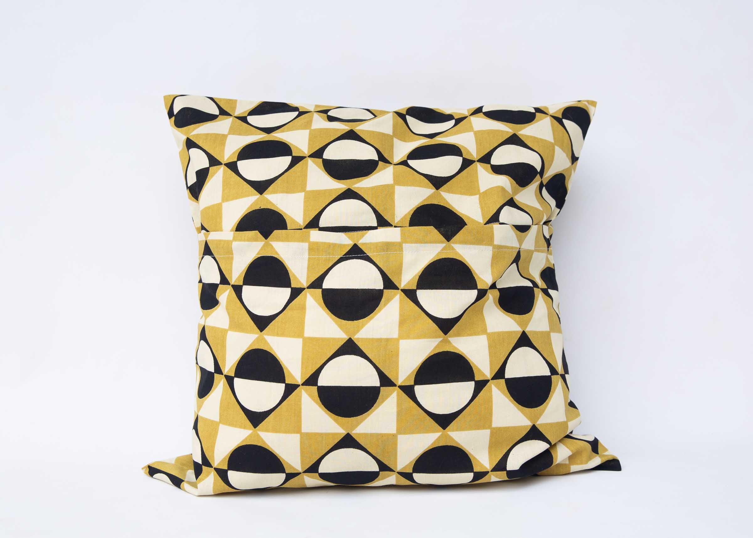 Display of 20x20 black, white and mustard pillow case