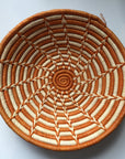 Orange and cream woven bowl