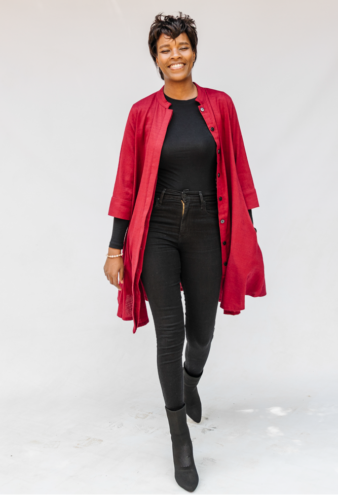 Model wearing burgundy linen dress.