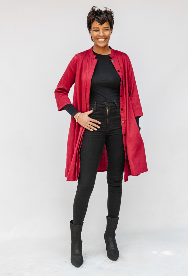 Model wearing burgundy linen dress.