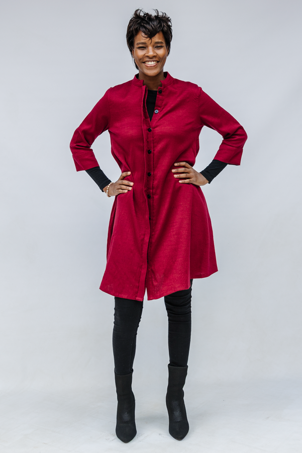 Model wearing burgundy linen dress.