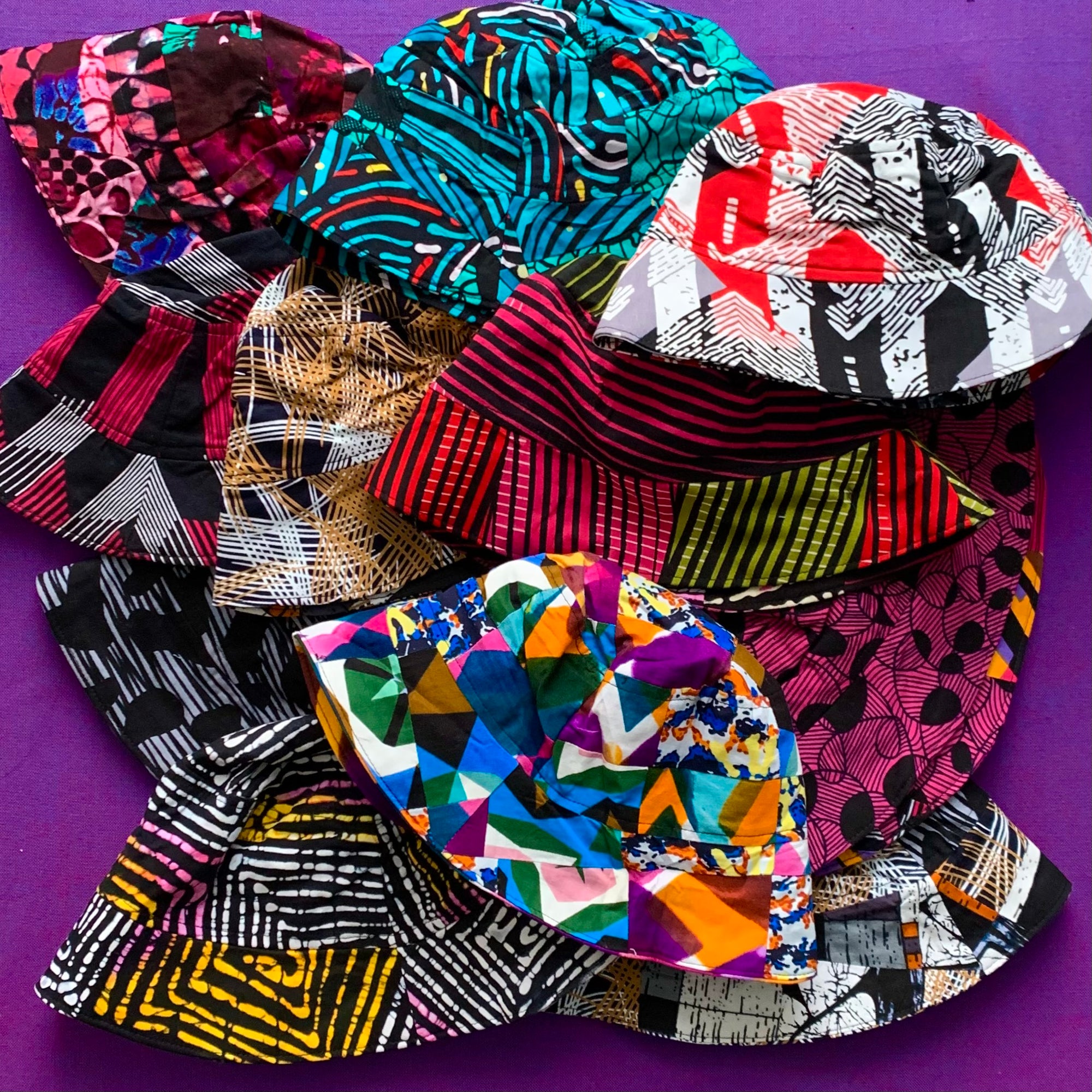 Display image of reversible, patchwork bucket hats.