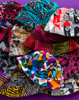 Display image of reversible, patchwork bucket hats.