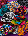 Display image of reversible, patchwork bucket hats.