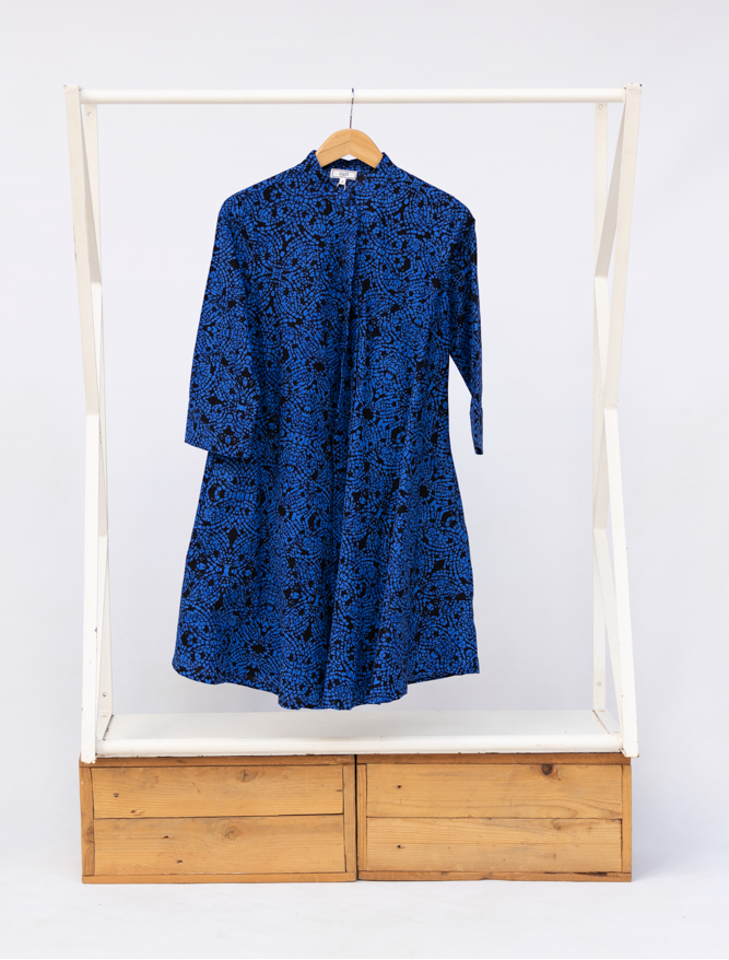 Display of black and blue floral dress.