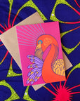 Hot pink greeting card with Red, purple orange flamingo