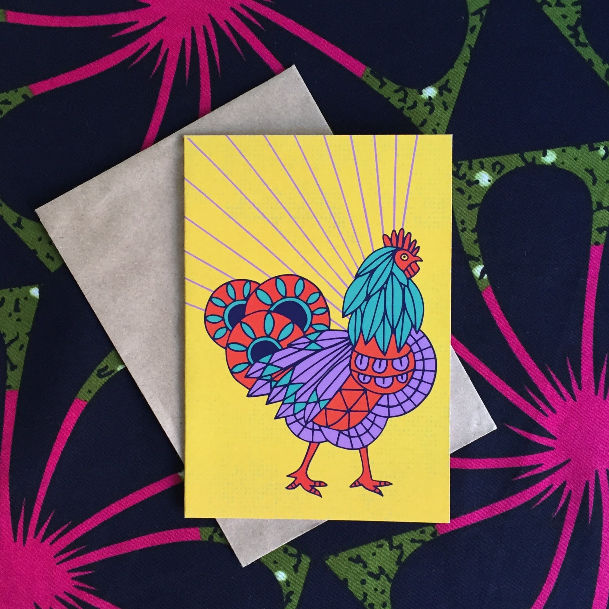 Multi-colored rooster with yellow background