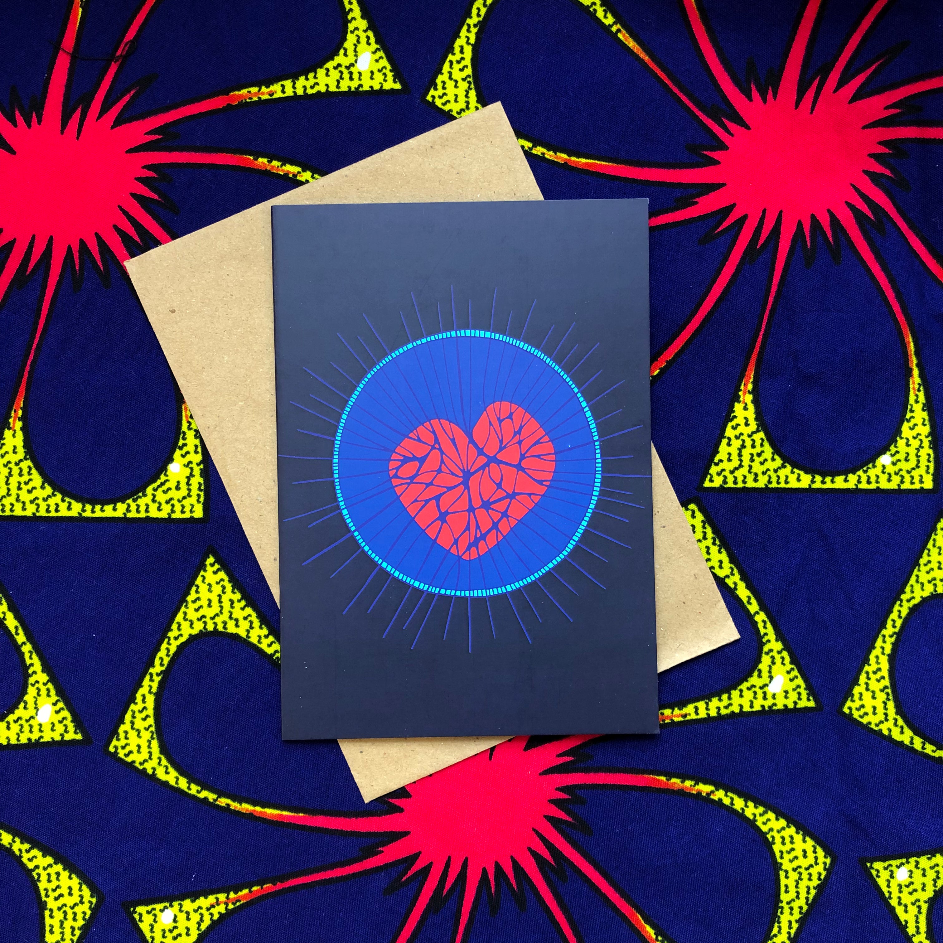 The display of blue greeting card with a red heart