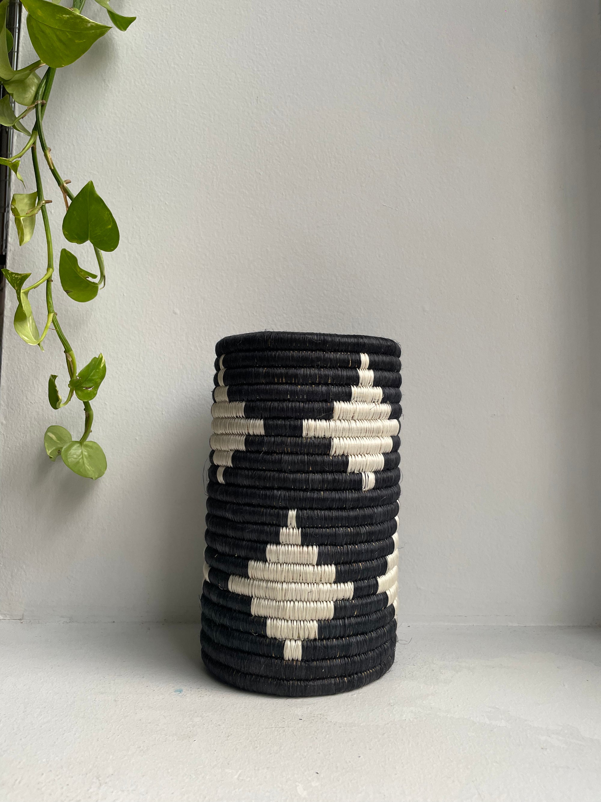 Display of white and black vase