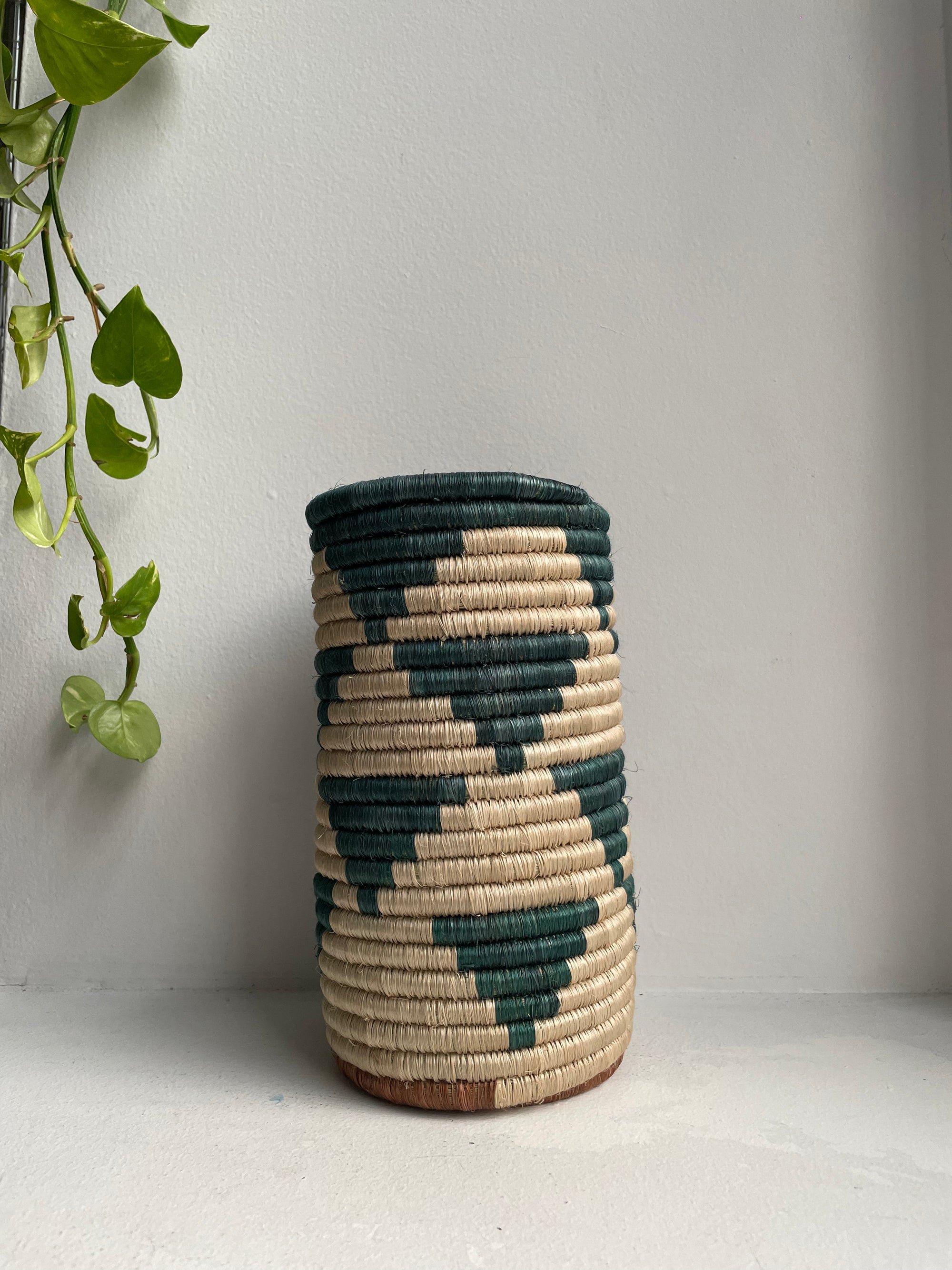 Display of teal triangle vase