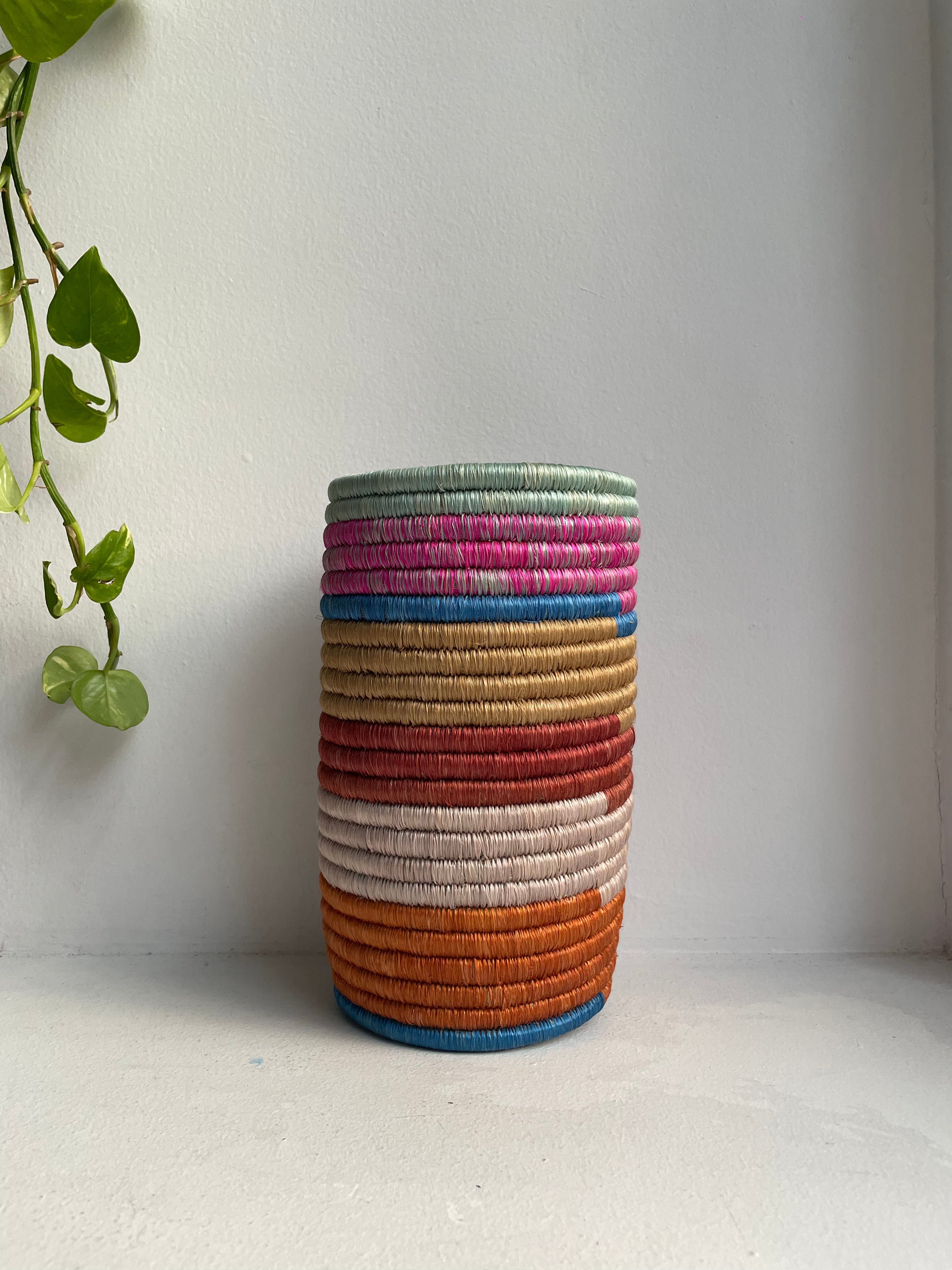 Display of multicolored striped vase