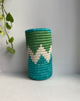 display of aqua blue, white and green vase