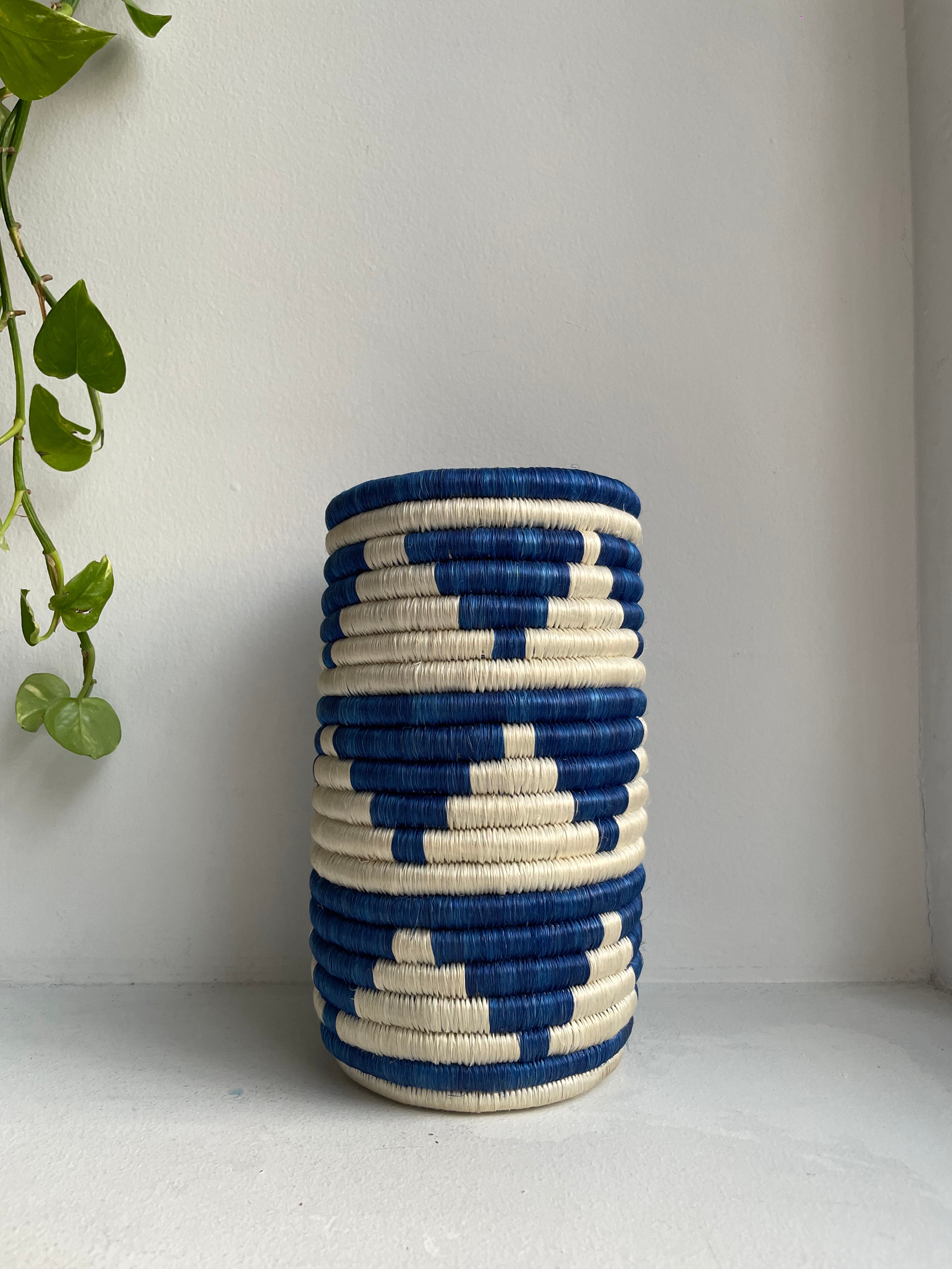 Display of blue and white triangle vase