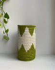 Display of grass green and white colored vase
