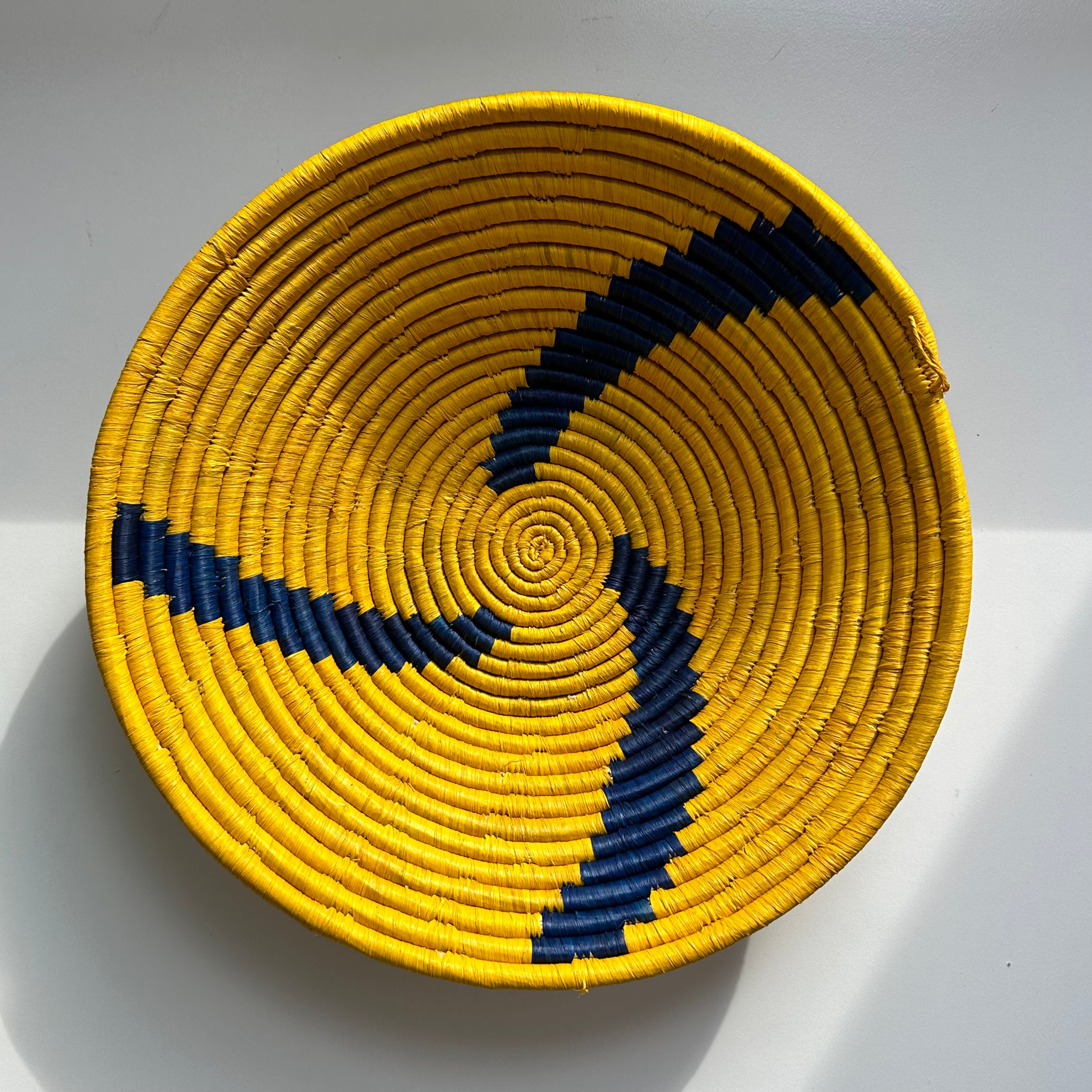 yellow and blue woven bowl