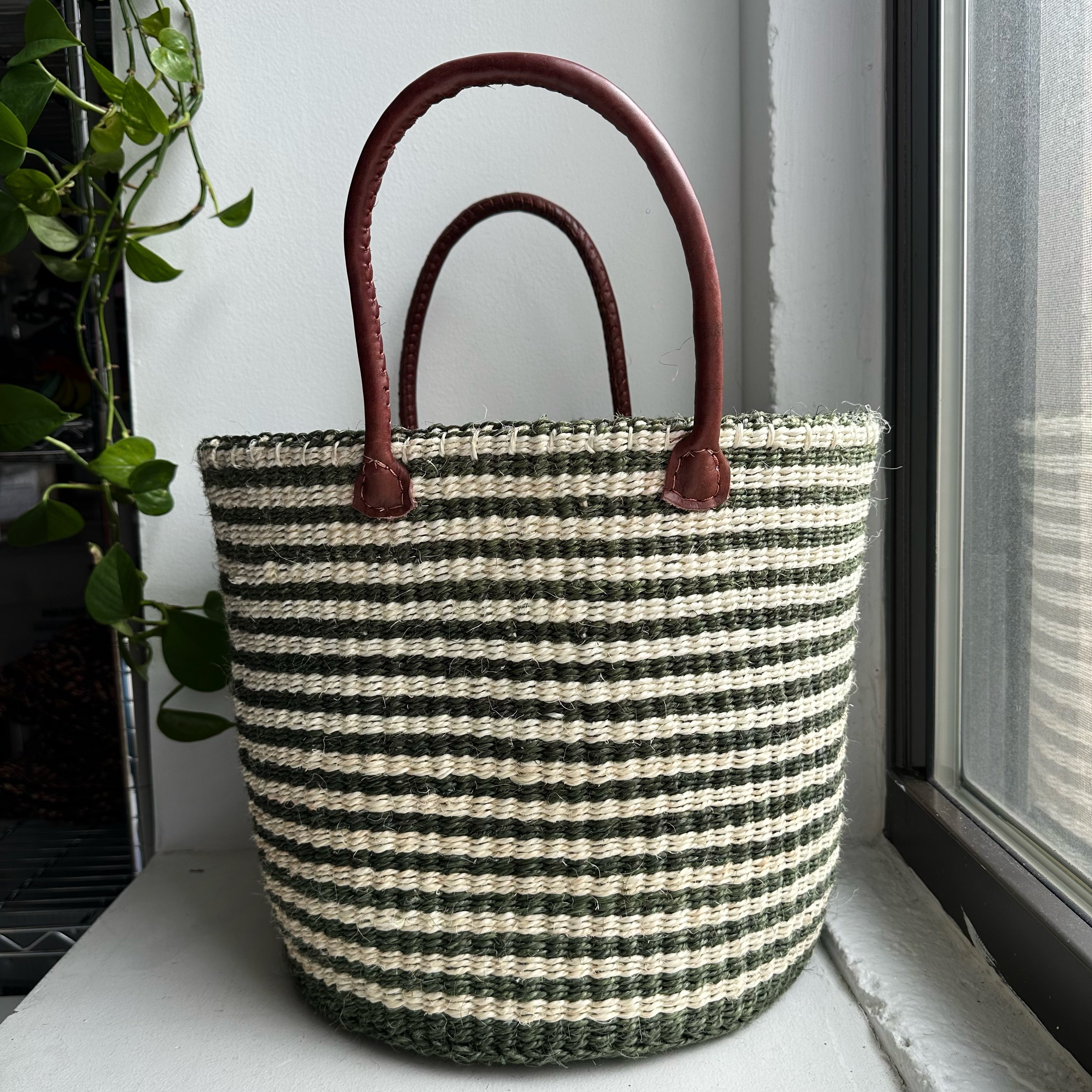 green striped handle basket