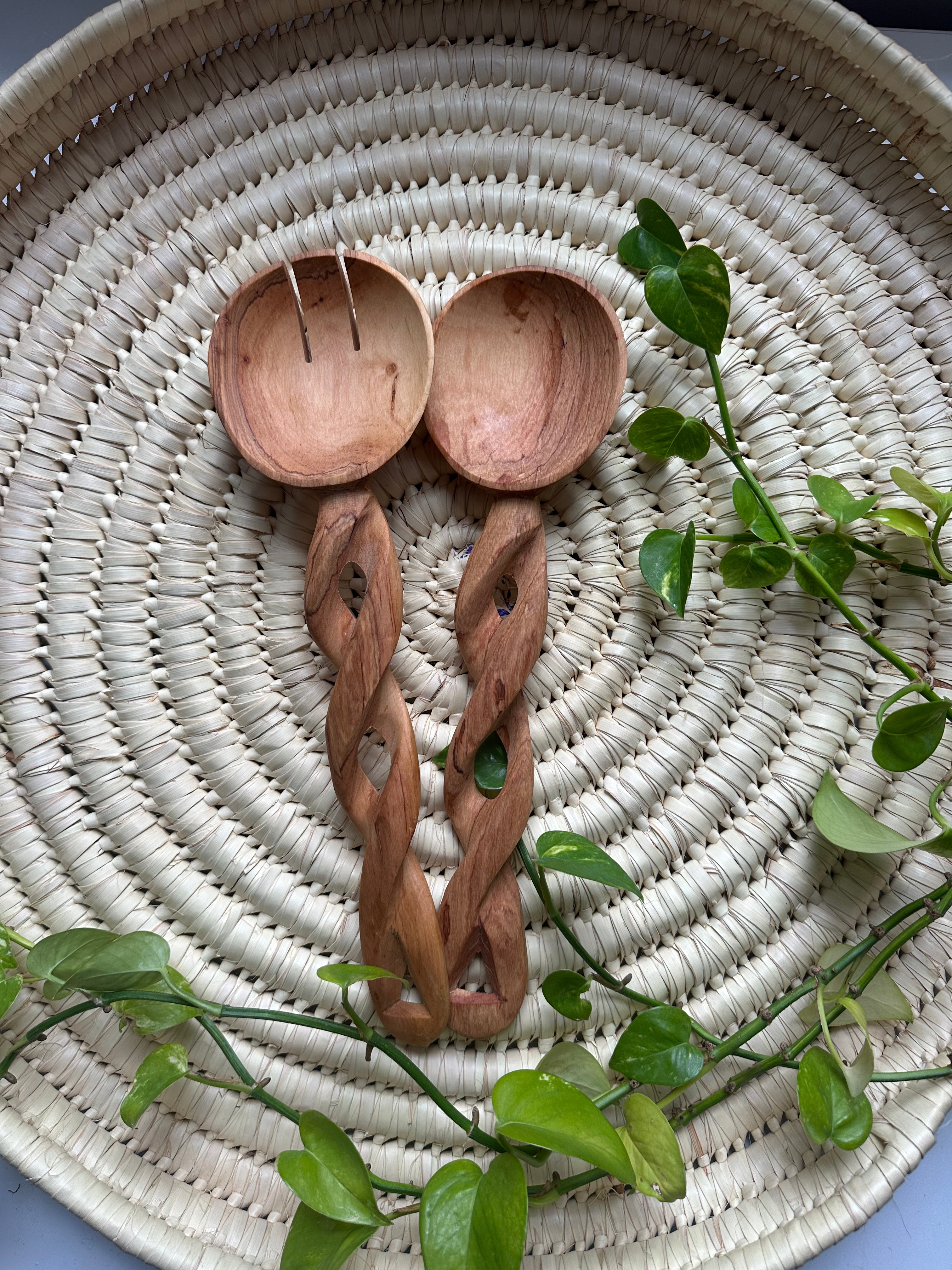 Display of long twisted wooden spoons