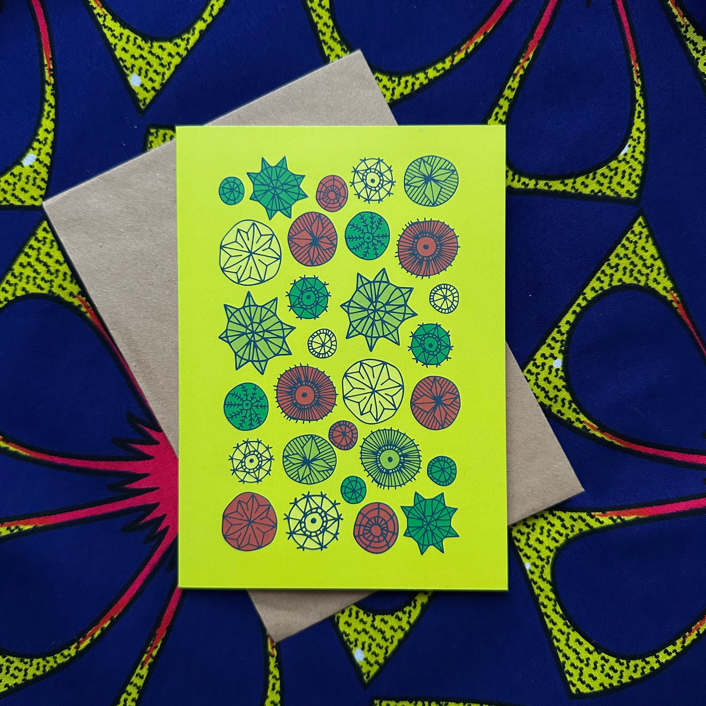 Yellow greeting card with vibrant flora and fauna 