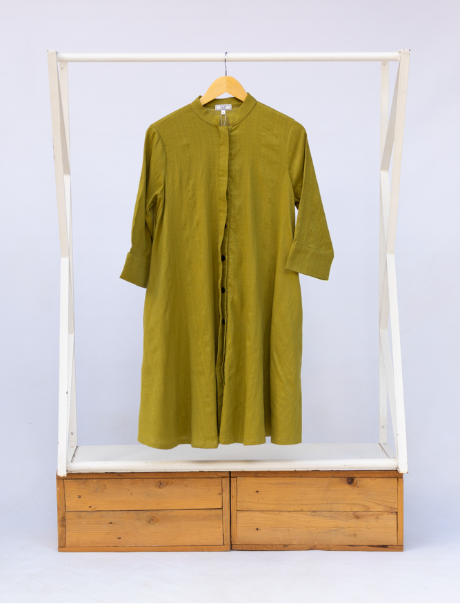 Display of olive green linen dress.
