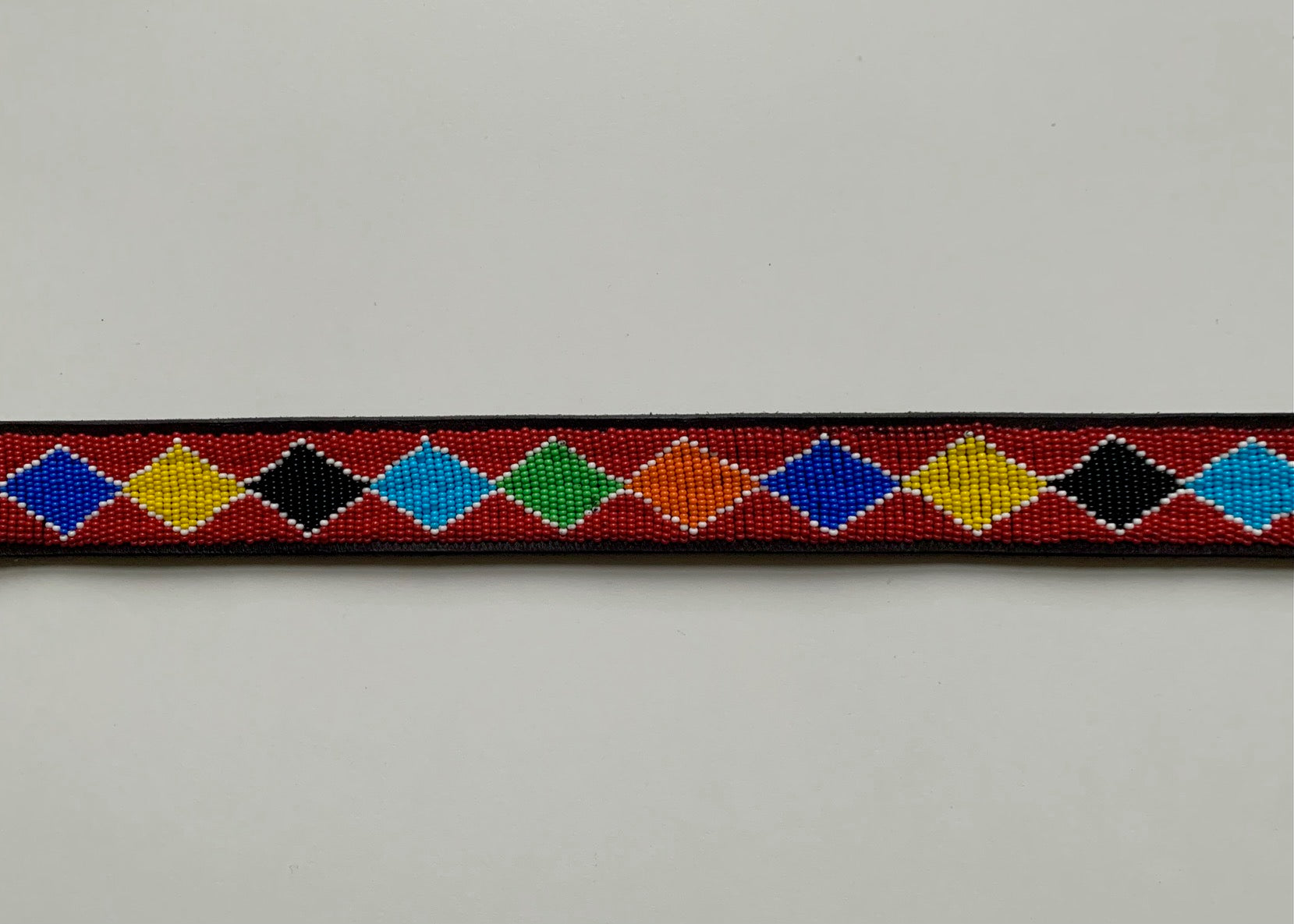 Red beaded belt with rainbow diamonds