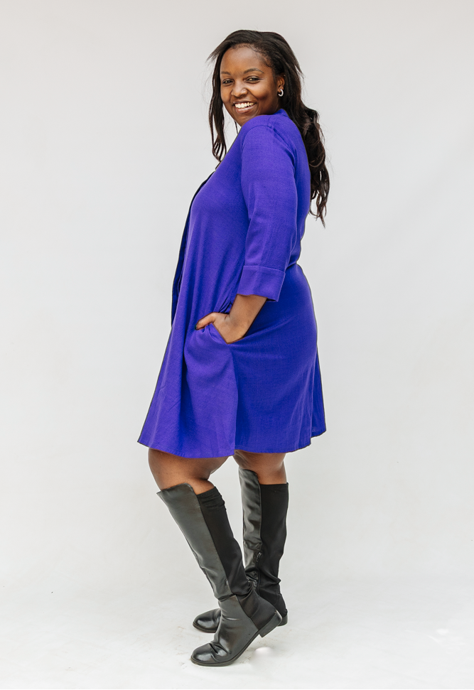 Model wearing deep blue linen dress.