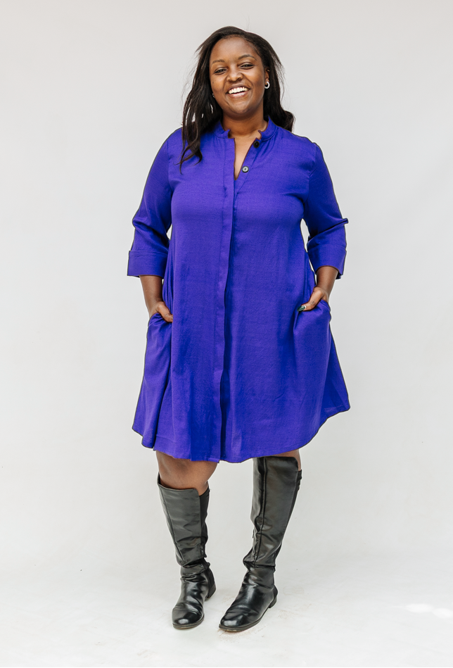 Model wearing deep blue linen dress.