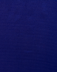 Close up display of deep blue linen dress, fabric.