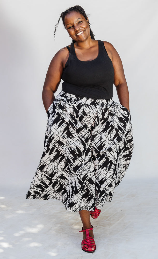 Model wearing black and white abstract culotte.