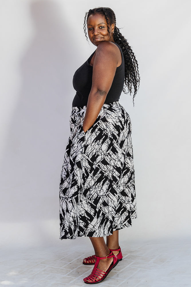 Model wearing black and white abstract culotte.