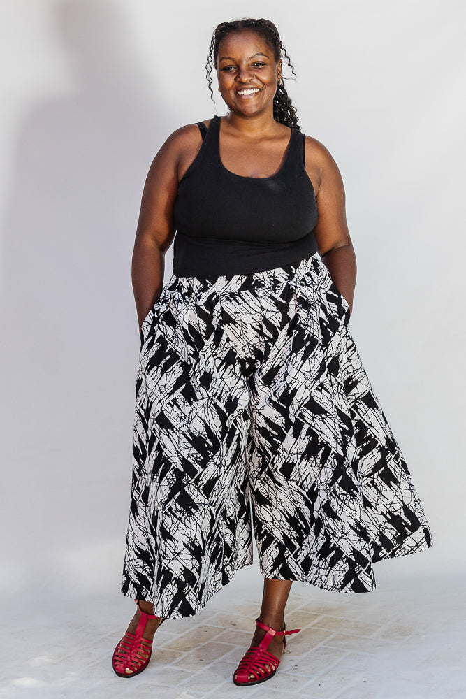 Model wearing black and white abstract culotte.