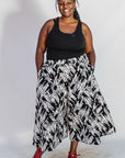 Model wearing black and white abstract culotte.